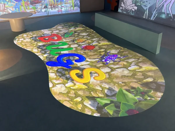 Children Interactive Floor System displaying colorful educational games and activities for childreninteracting with colorful educational games projected onto an interactive floor