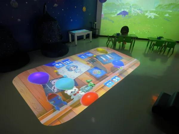 Interactive floor projector displaying educational games in a children's learning and activity room