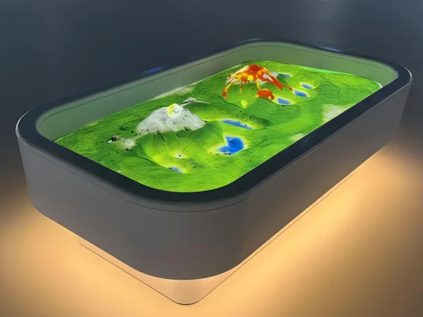 Interactive AR sandbox displaying virtual terrain, water and volcanoes