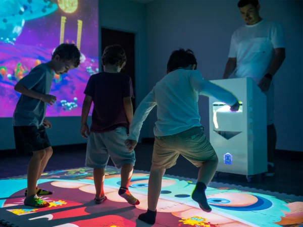 Children playing games on the Interactive Mobile Floor