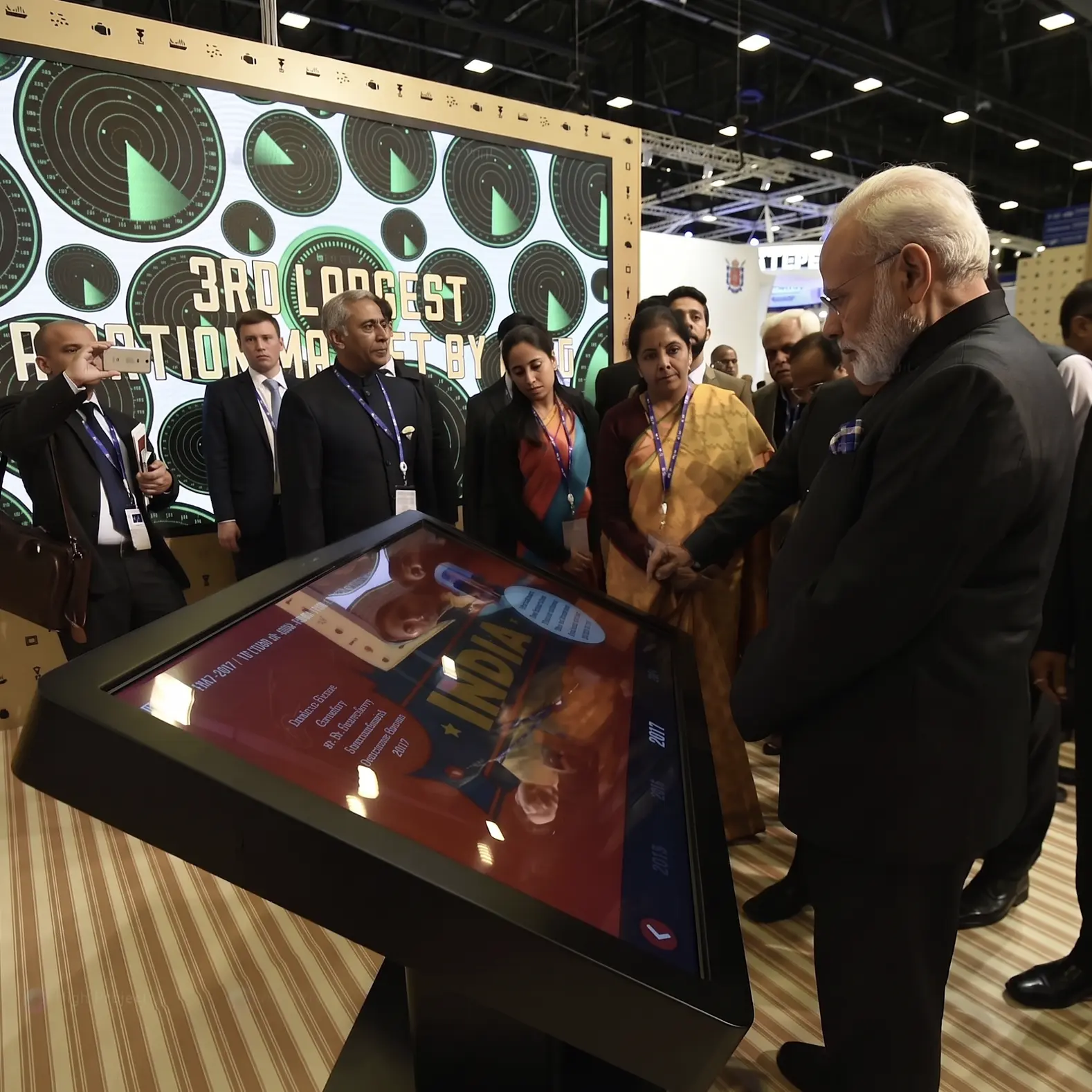 Government delegate using one of our interactive tables at an international exhibition